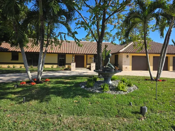 581 S Country Club Drive, Atlantis, FL 33462